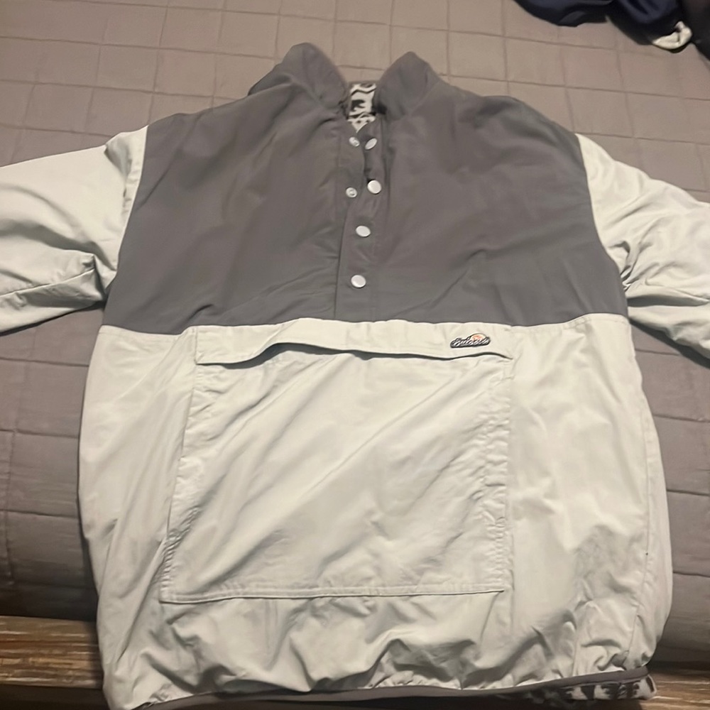 Chubbies Reversible 1/4 Zip. Wind Resistant with pouch, fleece reverse.
